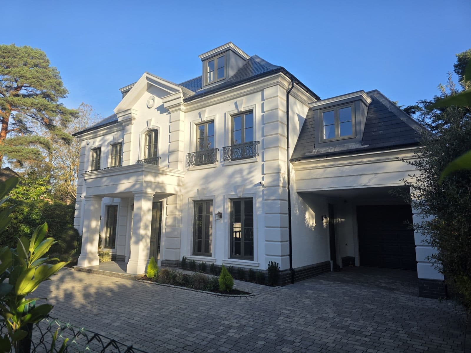 Side elevation and carport with eaves cornice and dormer cornices