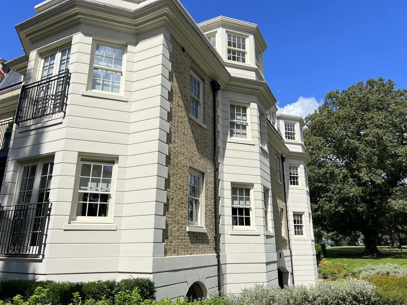Bay elevation: quoins, string bands and window surrounds