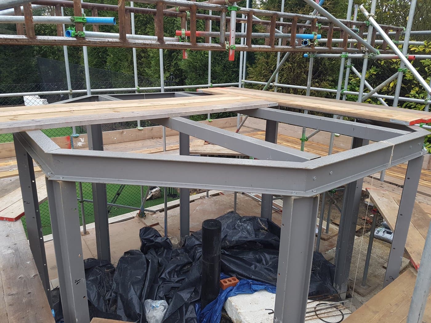 Steel frame before the architectural profiles were fitted.