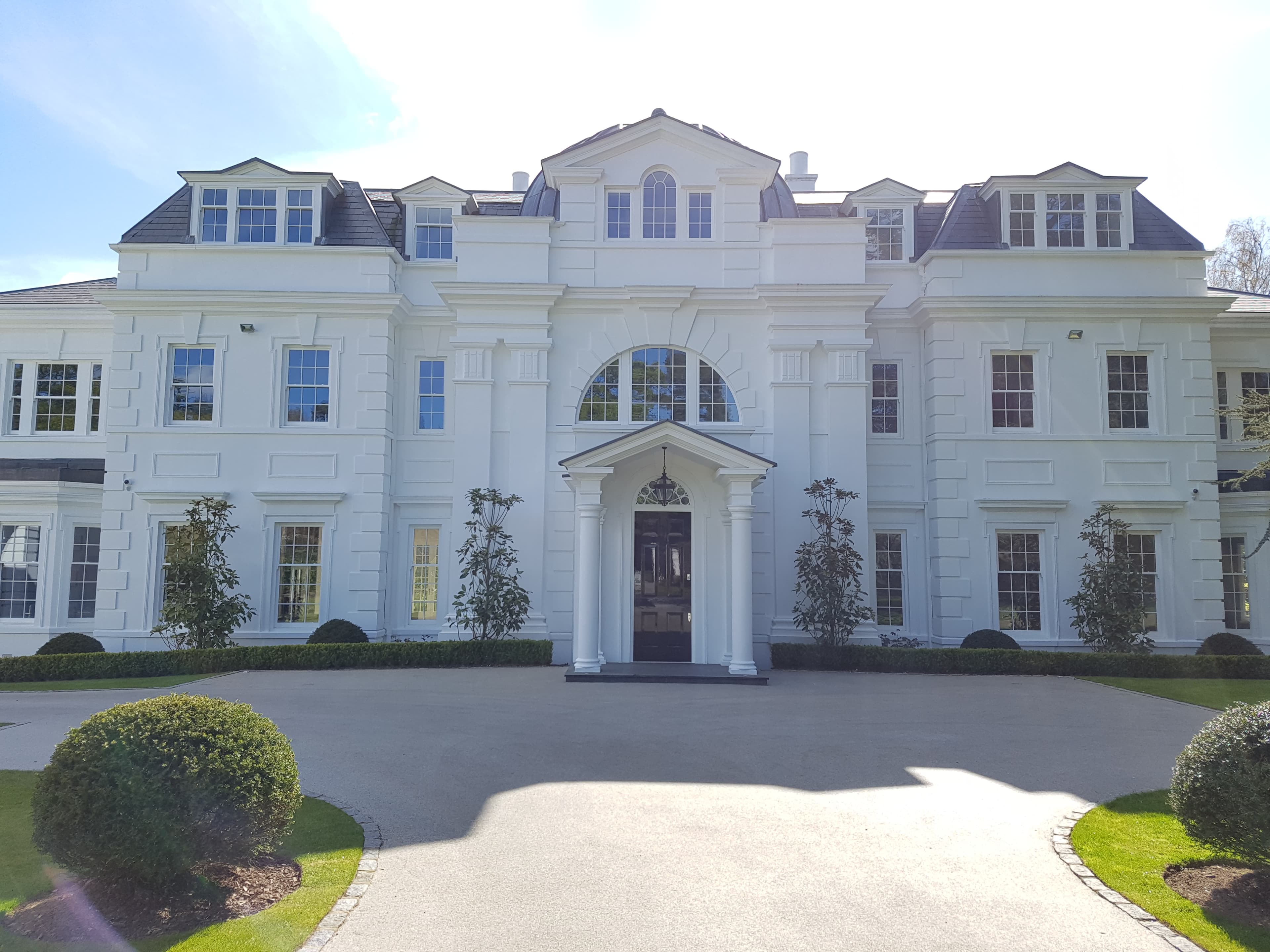 Completed Taylormade Facades project — classical render facade with cornice, quoin and portico detailing