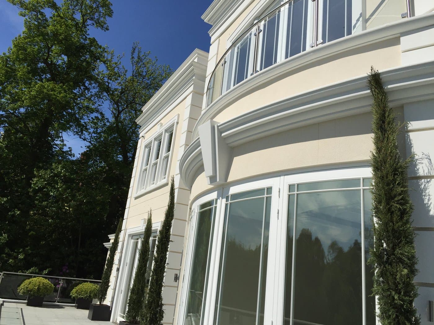Cornice and corbel detail around a projecting bay.