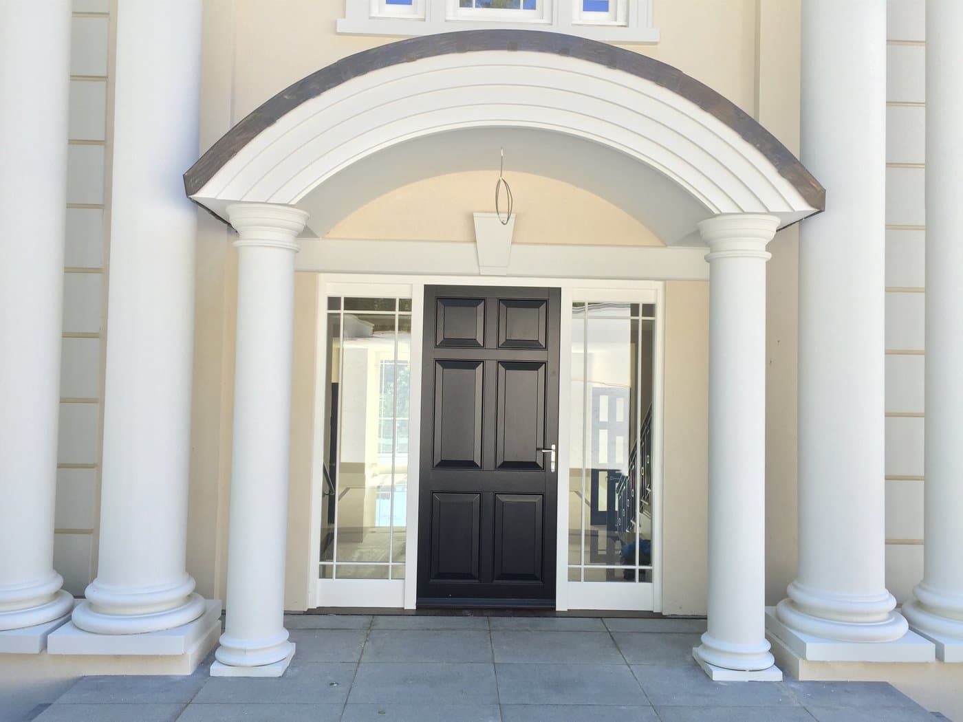 Entrance portico and arched canopy.